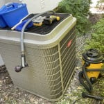 AC coil cleaning - how to do it yourself with simple tools and a garden hose.
