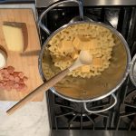 Velveeta cubes and butter added to pasta for creamy mac and cheese.
