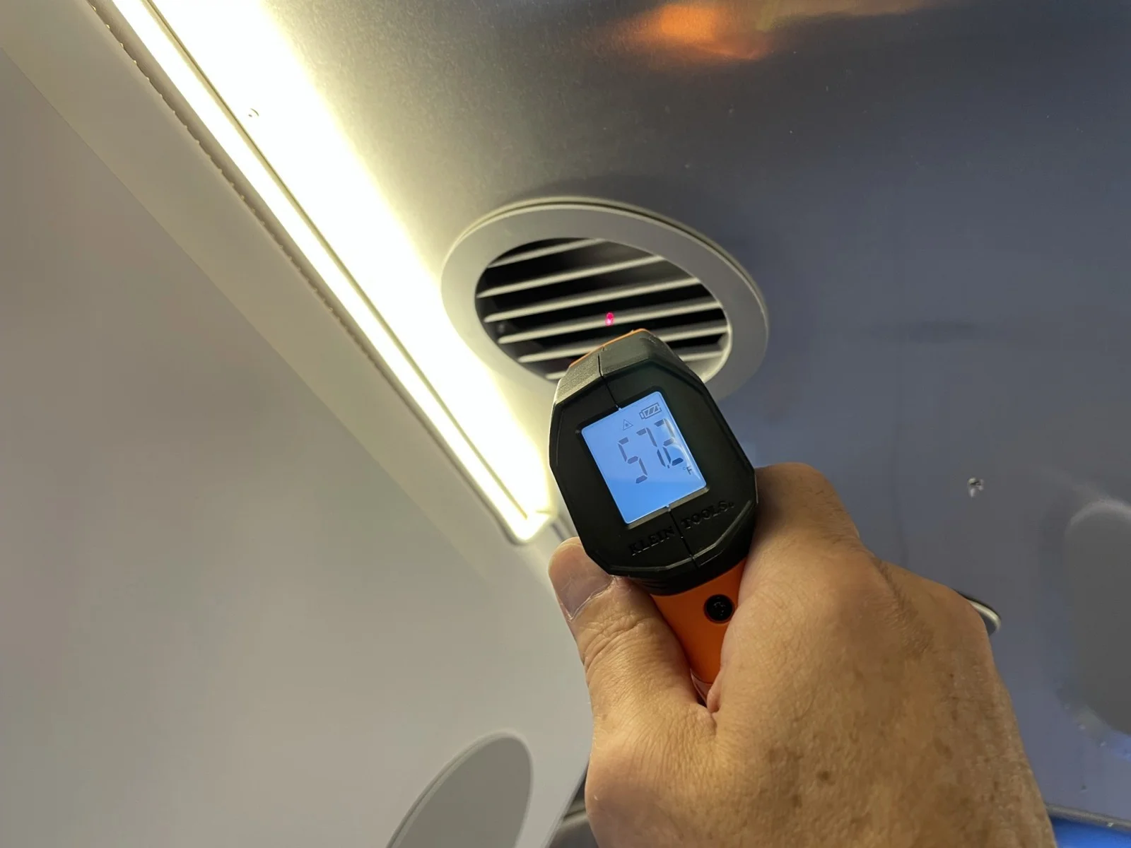 The supply air temperature ranged between 55 and 60℉ after our modifications of our Airstream AC system.