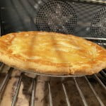 Bake chicken pot pie for 30-40 minutes at 400 ℉ until the crust is golden brown.