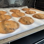 Wickedly good chocolate chip cookies recipe showing cookie dough baking and almost done.