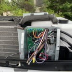 EasyStart wires pulled into the electrical box of the RV AC (Dometic Penguin II).