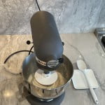 Pizza dough knead with stand mixer on low with dough hook for 3 mintues.