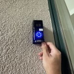 Once the battery is re-inserted, the doorbell will restart and a ring of blue lights will light around the button.