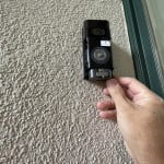 Replace the recharged Ring doorbell battery pack into the doorbell body.