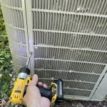 Remove the condenser grills by removing the screws holding them in place.