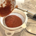 Smooth pizza sauce with immersion blender to remove any large tomato pieces.