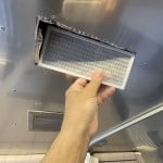 Remove the Airstream Dometic AC intake grills and air filter to inspect the return plenum area.