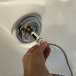Install replacement Moen 1222 faucet cartridge by sliding into the faucet body.