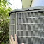 Adjacent panels overlap and connect with reassembly of the condenser grills.