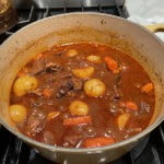 Simmer stew to reduce for 30 minutes.